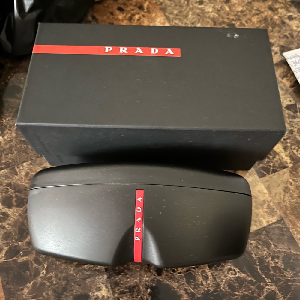Prada sunglasses brand new never worn in original box
